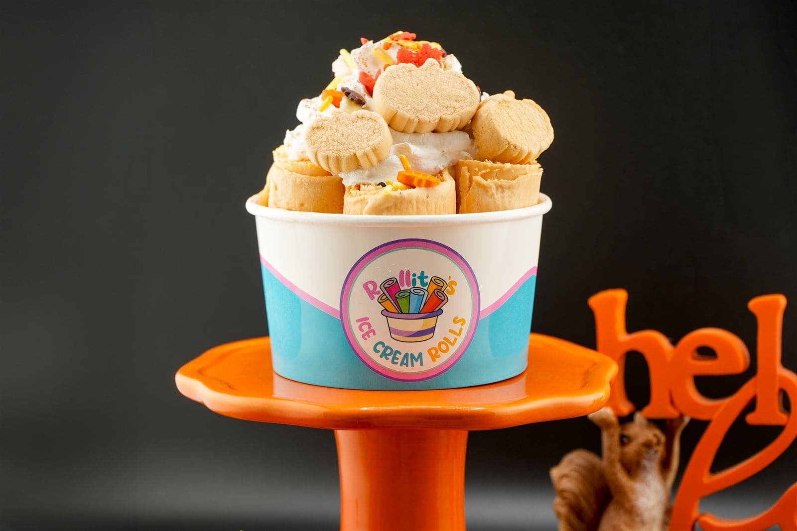 Signature taco roll topped with whipped cream and cookies
